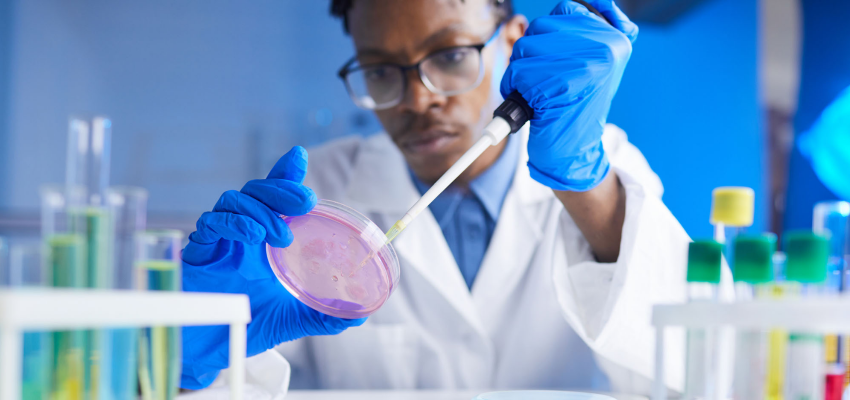 Image of biomedical students in a lab setting.